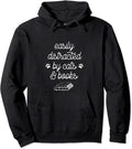 Easily distracted by cats and books Pullover Hoodie