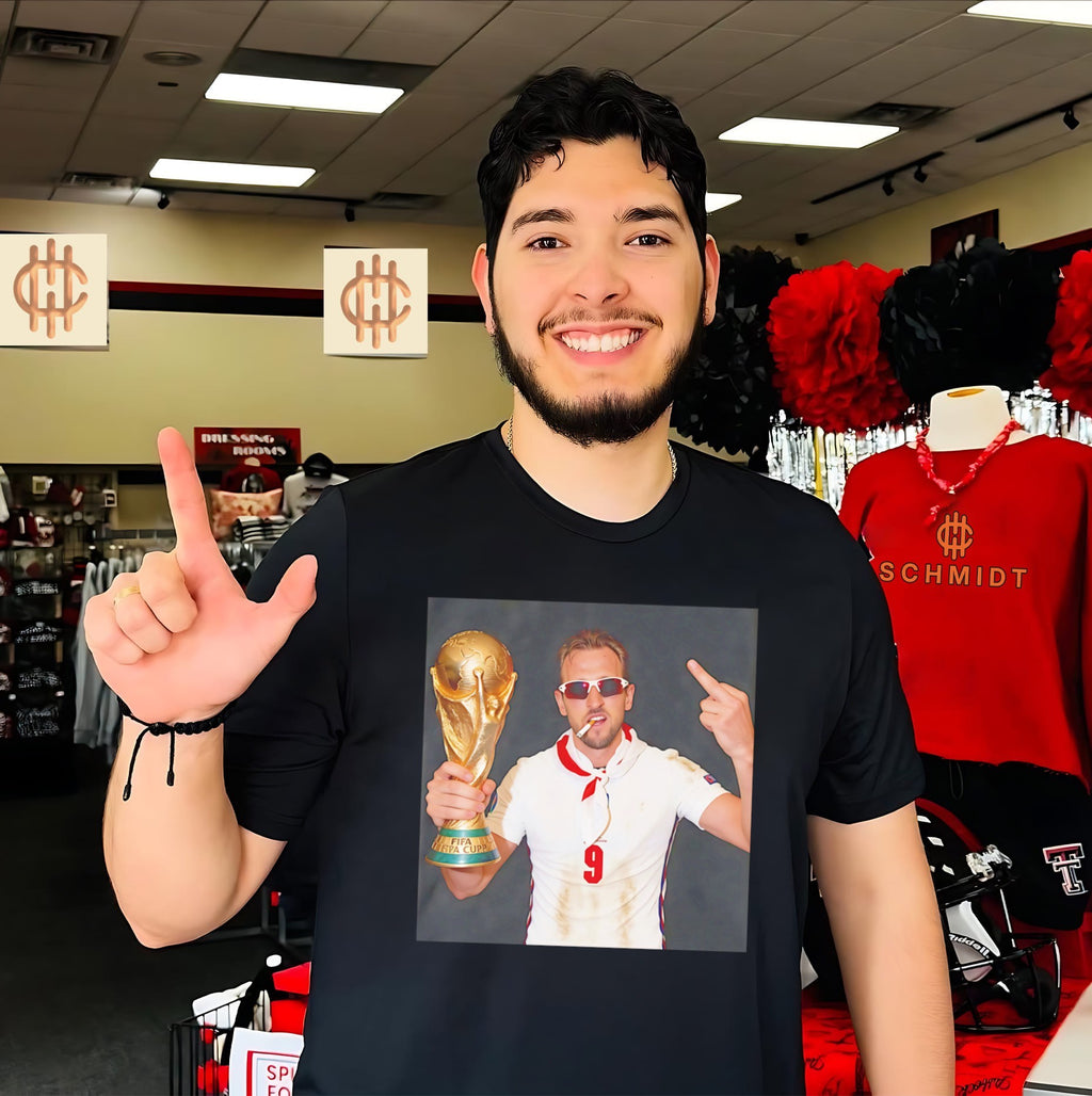 Harry Kane 2026 World Cup holding trophy middle finger shirt