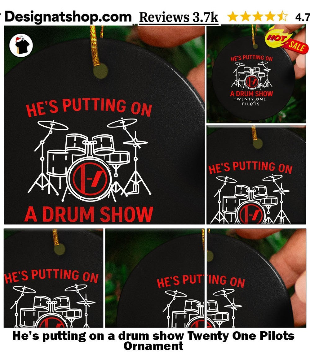 He’s putting on a drum show Twenty One Pilots shirt