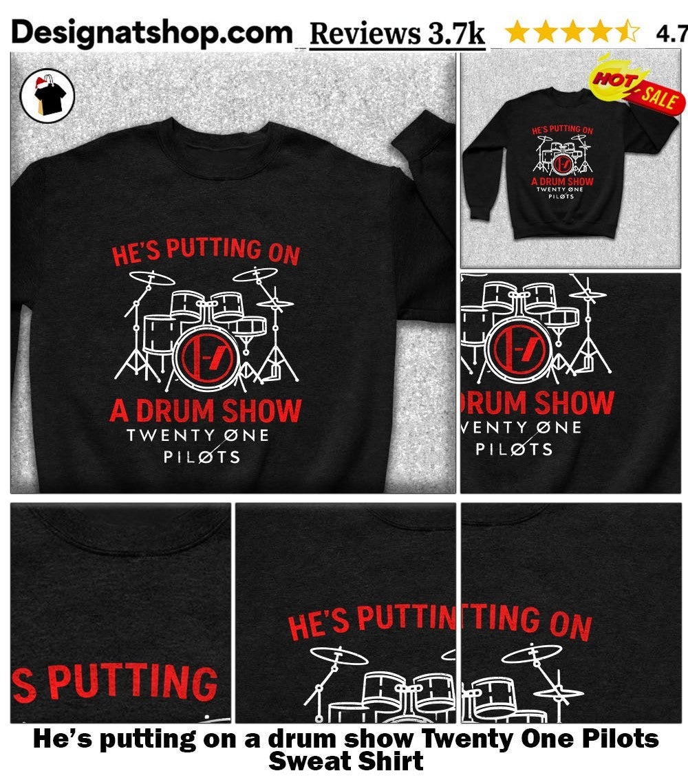 He’s putting on a drum show Twenty One Pilots shirt