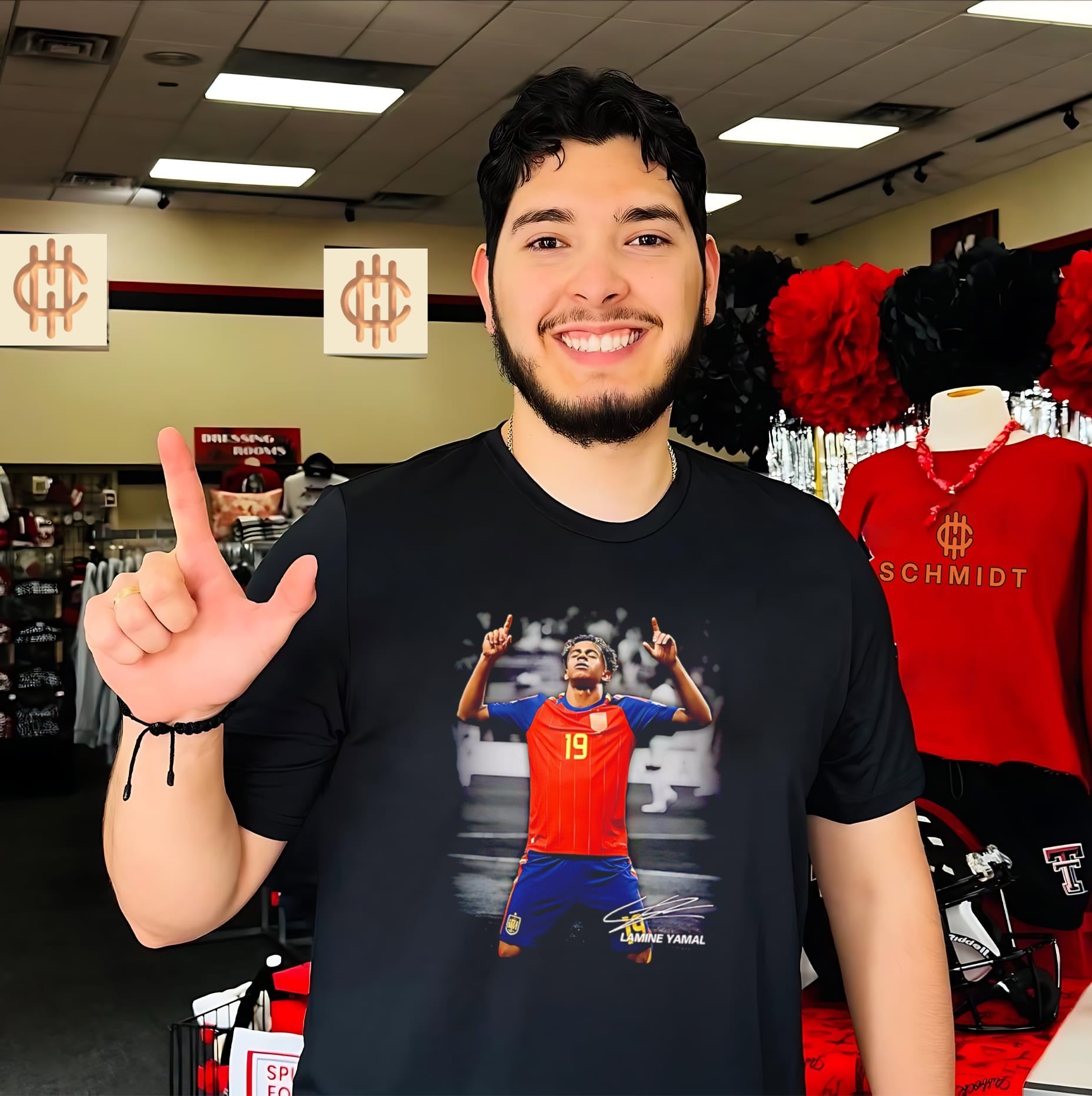 Lamine Yamal posing signature shirt