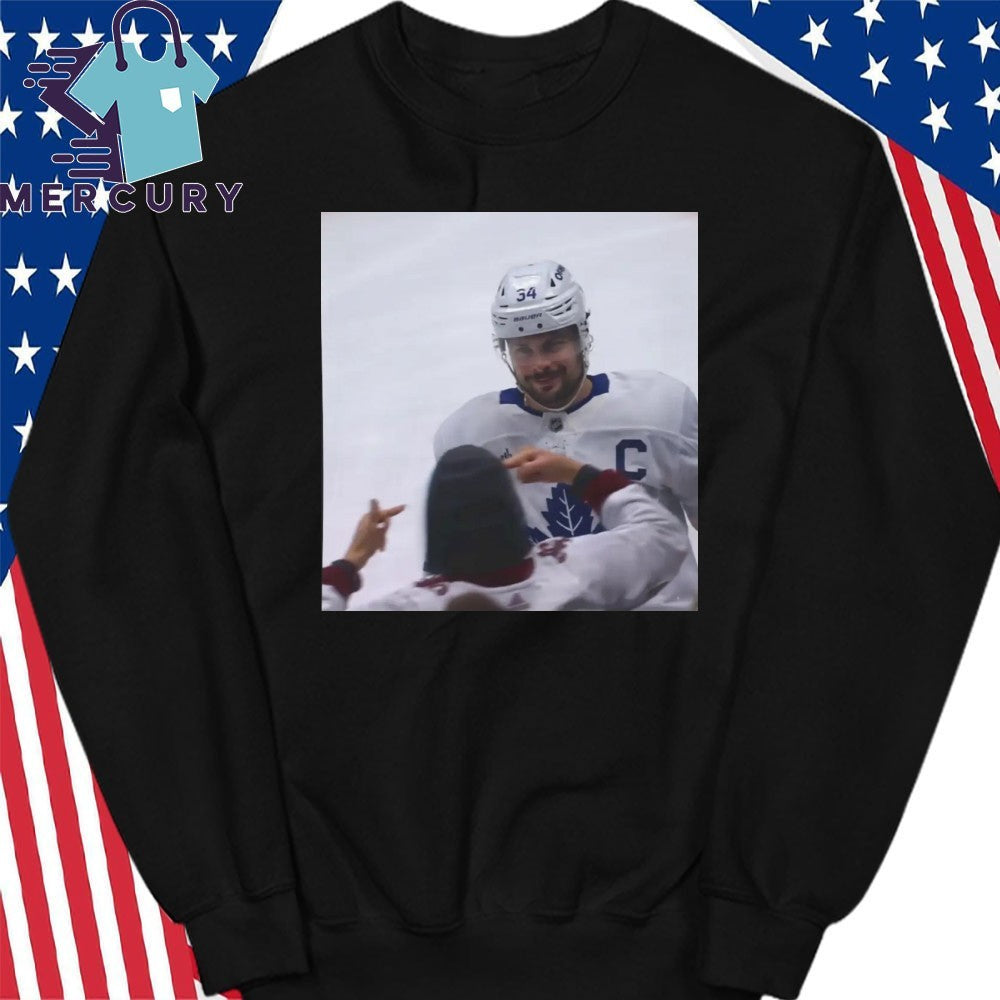 Auston Matthews Smirks At The Avs Fans Shirt