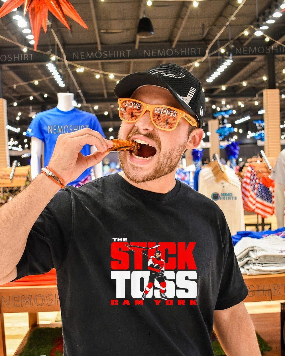 The stick toss Cam York Philadelphia Flyers shirt