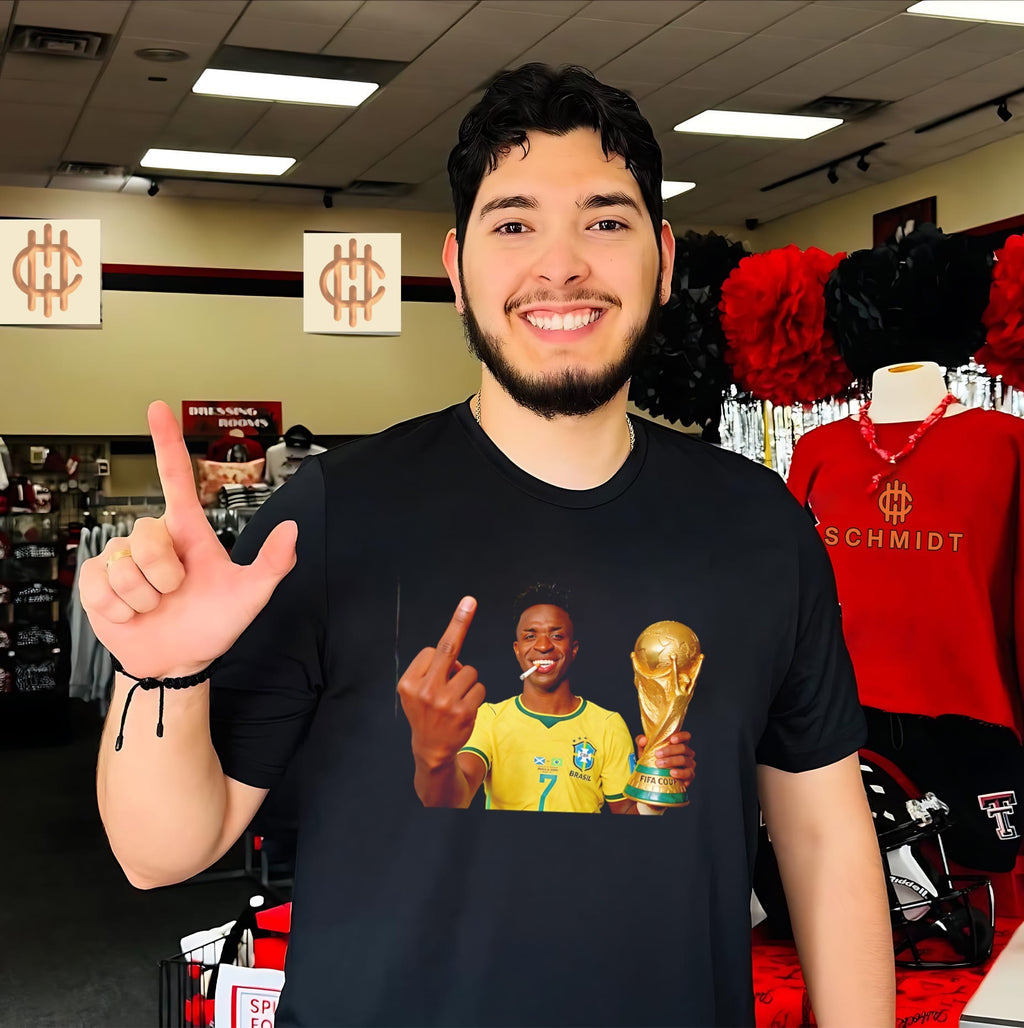 Vinicius Jr smoking holding trophy middle finger 2026 World Cup shirt