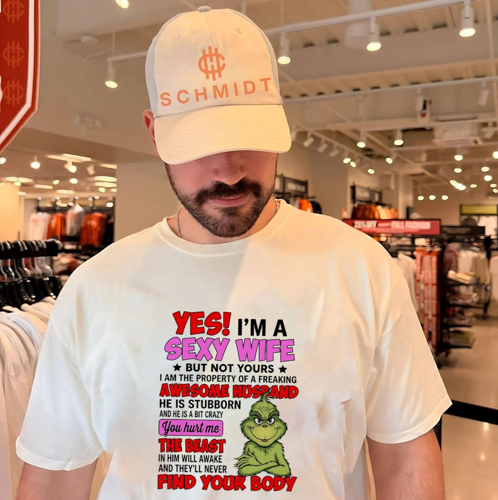 Yes I’m a sexy wife but not yours I am the property of a freaking awesome husband he is stubborn Grinch shirt