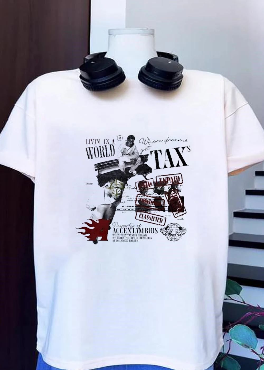 Property of Accentambios Man Sitting Livin in a World Where Dreams get Taxs Unpaid Classified T-Shirt