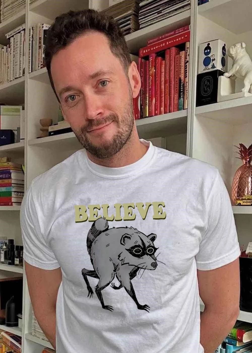 Believe Raccoon Walking Funny Animal Illustration T-Shirt