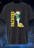 Betty Winking and Leaning on Helmet Packers shirt