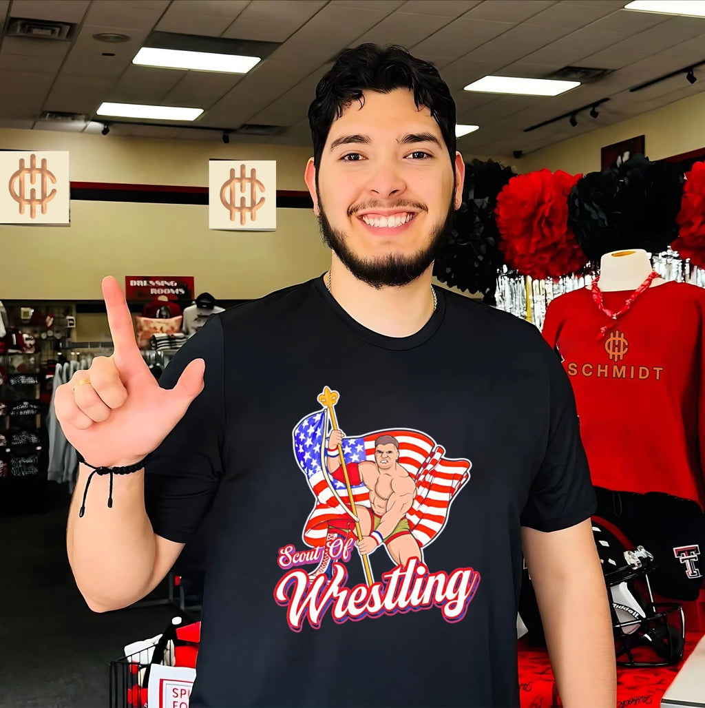 Scout of Wrestling Danny Everbourne holding American flag illustrated shirt