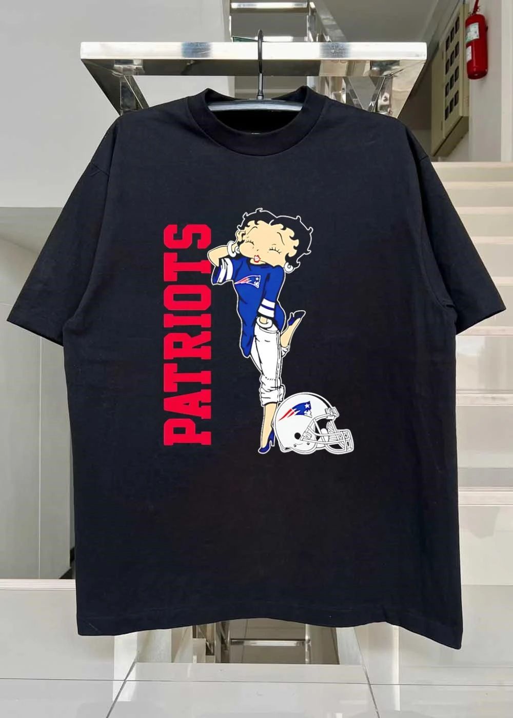 Patriots Betty Standing with Helmet Patriots shirt